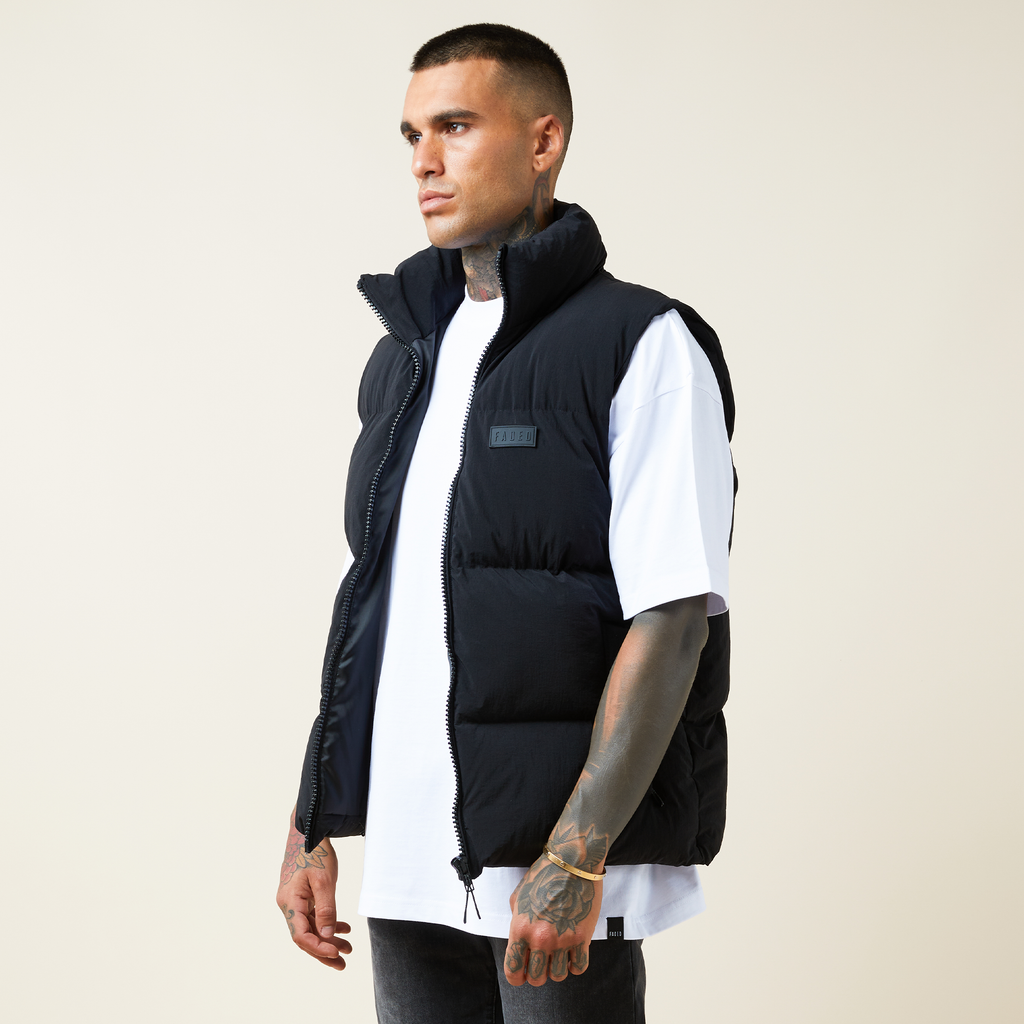 Man wearing bubble gilet with white tee